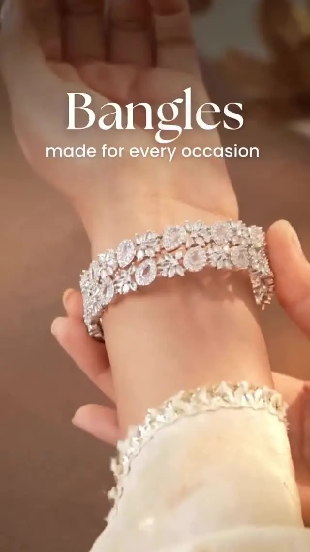 Jewellery reel still of a diamond bangle worn on the wrist